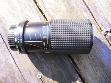Tokina RMC 80-200mm/4.0 telelens. Minolta dop. In leren hoes beschikbaar voor biedingen