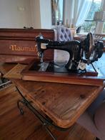 Naumann naaimachine, Ophalen