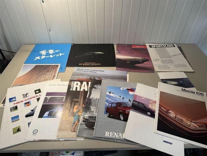 auto reclame boeken - renault mazda suzuki etc, Boeken, Auto's | Folders en Tijdschriften, Zo goed als nieuw, Mazda, Ophalen of Verzenden