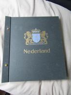 DAVO album met vensters 1956 t/m 1983, Postzegels en Munten, Postzegels | Volle albums en Verzamelingen, Verzenden, Nederland