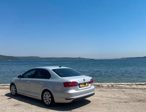 Volkswagen Jetta 1.6 TDI 77KW 2013 zilver/grijs, Auto's, Volkswagen, Particulier, Jetta, ABS, Adaptieve lichten, Airbags, Airconditioning