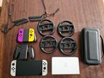 Nintendo Switch OLED + Extra Joy-Cons & Accessoires, Spelcomputers en Games, Gebruikt, Overige genres, Ophalen of Verzenden, Eén computer
