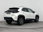 Toyota Yaris Cross 1.5 Hybrid Dynamic Limited (bj 2024), Stof, Gebruikt, Met garantie (alle), 116 pk