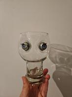 Glas met ogen, Ophalen