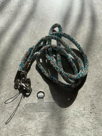 Crossbody cord voor cover beschikbaar voor biedingen