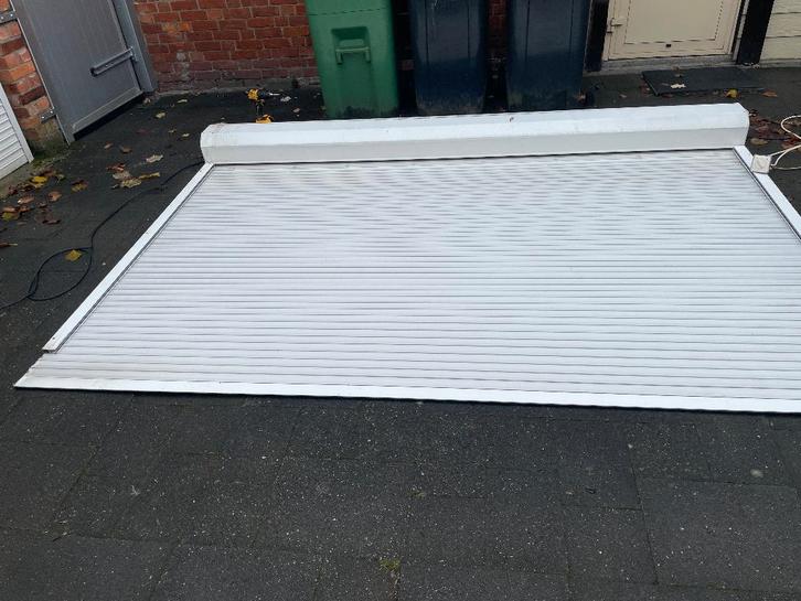 wit electrisch rolluik breed 3.02 mtr x 1.94 mtr hoog, Doe-het-zelf en Verbouw, Rolluiken, Gebruikt, 150 tot 200 cm, 200 cm of meer