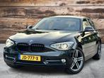 BMW 1-serie 125i High Executive Sport | Full Options | Zeer, Achterwielaandrijving, Gebruikt, Zwart, Navigatiesysteem