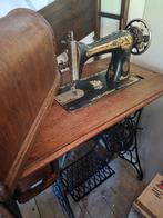 Te koop antieke naaimachine, Ophalen