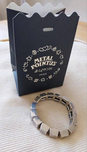 Metal Pointu's armband beschikbaar voor biedingen