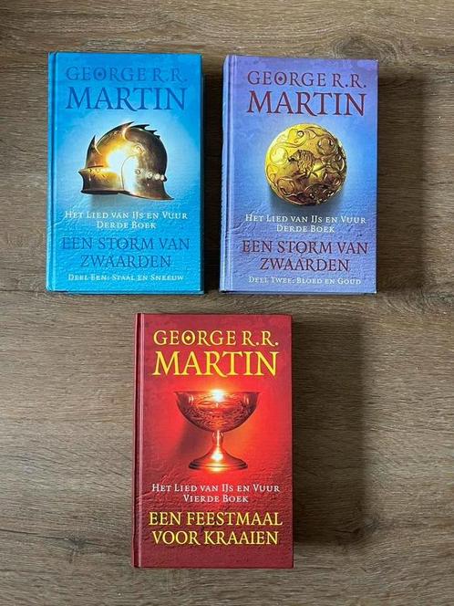 Een Storm van Zwaarden & Een feestmaal voor Kraaien, Boeken, Fantasy, Zo goed als nieuw, Ophalen of Verzenden