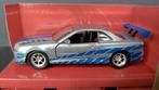 Brian's Nissan Skyline GT-R Bnr34 1:32 Jada Fast Furious Pol, Hobby en Vrije tijd, Modelauto's | 1:32, Verzenden, Nieuw, Auto
