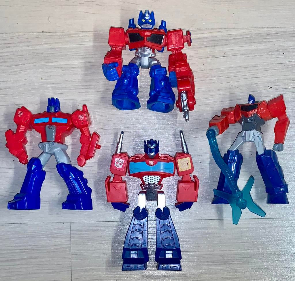 4 Transformers [Optimus Prime] 3x Happy Meal, 1x Rescue Bots, Overige generaties, Ophalen of Verzenden, Zo goed als nieuw, Autobots
