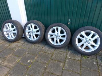 Set origine Opel sportvelgen 16 inch met goede winterbanden  beschikbaar voor biedingen
