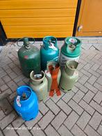 Gasflessen leeg of bijna leeg, Ophalen, Gebruikt