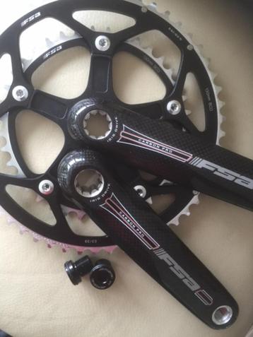 Race crankset's FSA Carbon Pro en triple hard steel crankset beschikbaar voor biedingen