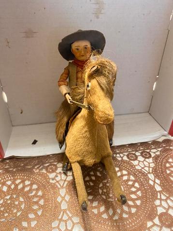 Antiek paard met Cowboy van  Roulet & Descamps beschikbaar voor biedingen