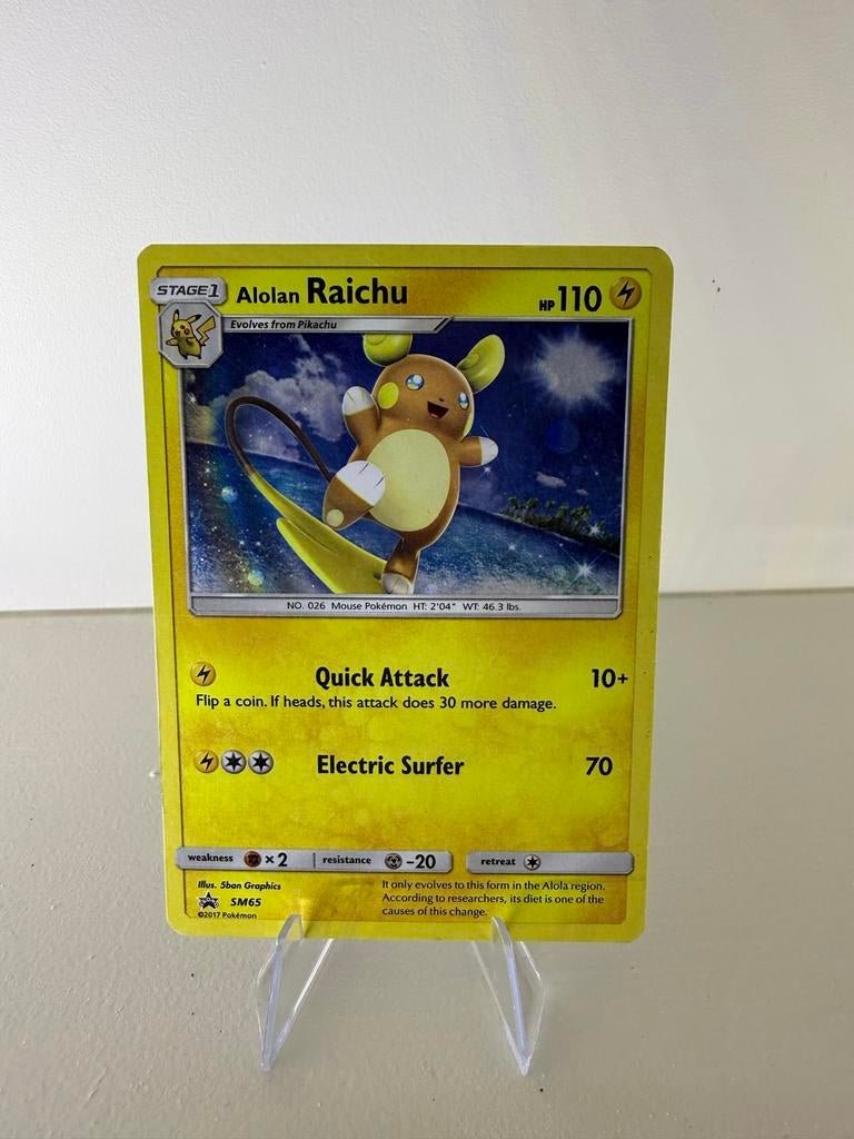 Alolan Raichu SM65 – Black Star Promo – LP – Pokémon, Hobby en Vrije tijd, Verzamelkaartspellen | Pokémon, Ophalen of Verzenden
