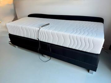 Elektrisch Verstelbaar bed 70x200 + 2 Matrassen beschikbaar voor biedingen