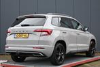Skoda Karoq 1.5 TSI ACT Sportline Business trekhaak camera, Lichtsensor, Stof, 4 cilinders, 150 pk