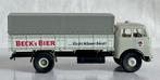 Brekina: MAN 10.212 huifvrachtwagen "Beck's Bier Bremen", Hobby en Vrije tijd, Modelauto's | 1:87, Ophalen of Verzenden, Zo goed als nieuw