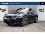 BMW iX1 eDrive20 High Executive M Sport / Panoramadak / Trek, Zwart, Nieuw, SUV of Terreinwagen, 1840 kg