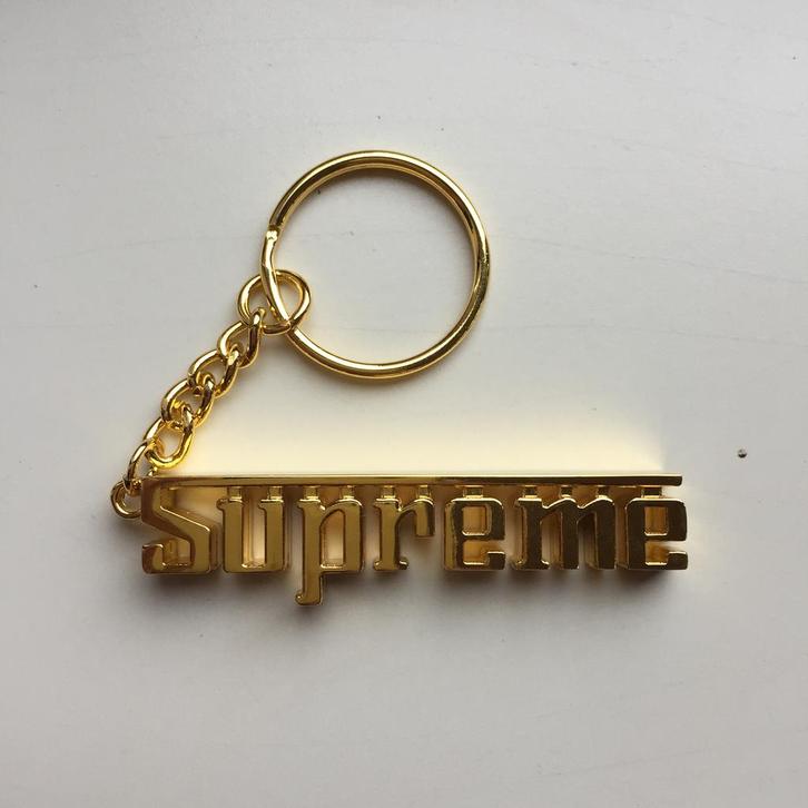 Supreme Grand Prix Keychain Golden FW16 sleutelhanger, Verzamelen, Sleutelhangers, Nieuw, Ophalen of Verzenden