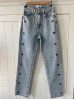 Redial lichtblauwe spijkerbroek met zwarte sterren maat 34, Kleding | Dames, Ophalen of Verzenden, Gedragen, Blauw, W27 (confectie 34) of kleiner
