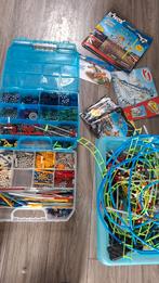 Doos vol K'nex met bouwboekjes, Ophalen