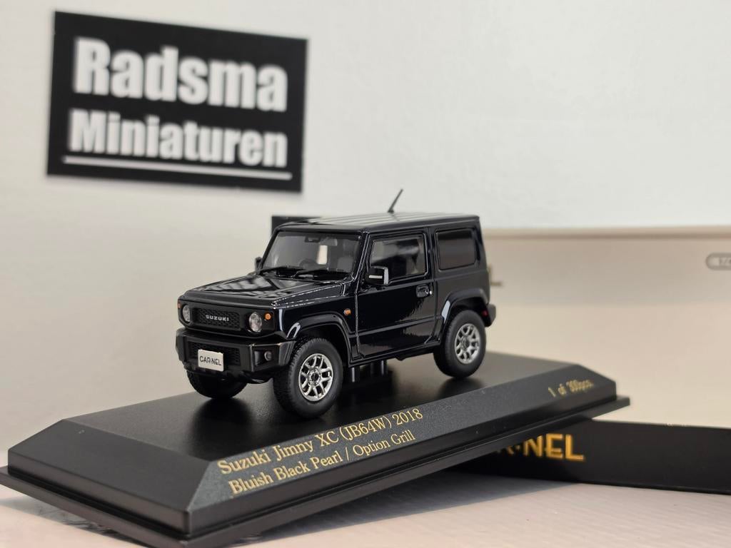 Suzuki Jimny XC 2018 - Zwart - 1:43 Car-Nel, Hobby en Vrije tijd, Overige merken, Auto, Nieuw, Ophalen of Verzenden