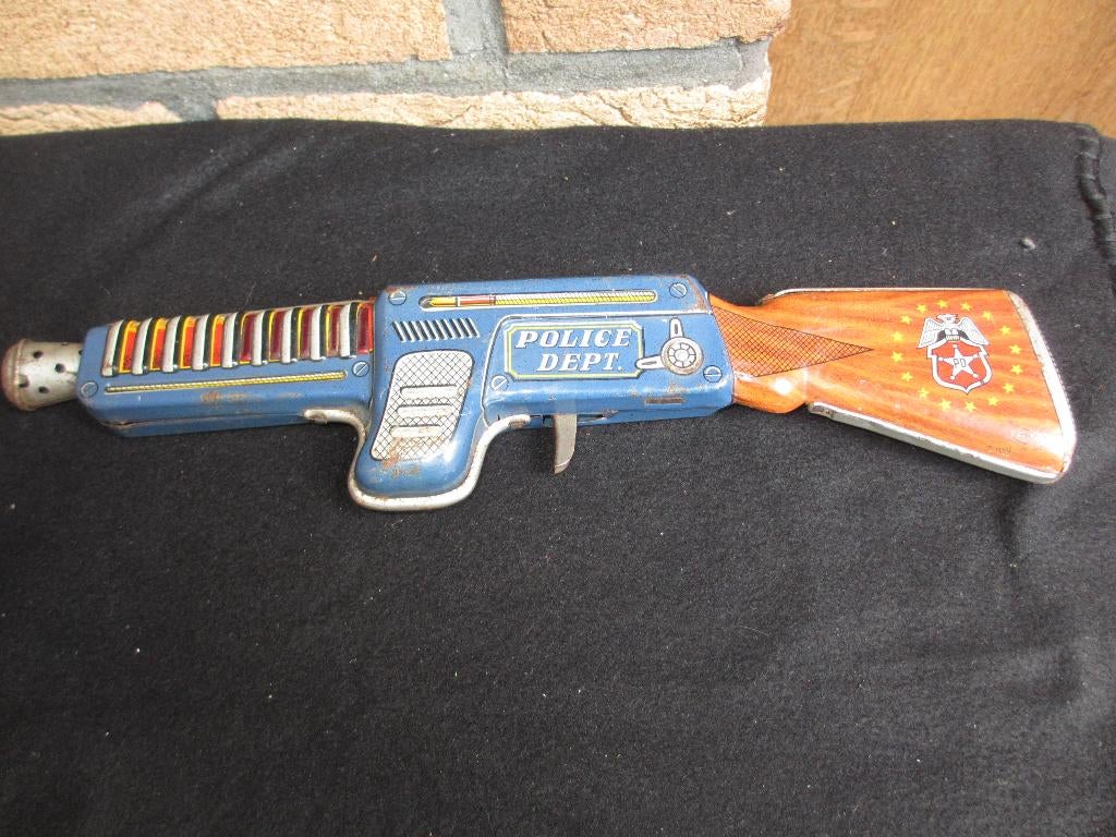 oud Japans blikken speelgoed T N Nomura politiepistool 50's, Ophalen of Verzenden