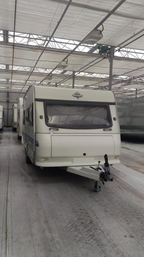 Hobby caravan 2001 met Unico Turijn XL luifel en inboedel, Vast bed, Hobby, Particulier, Tot en met 4