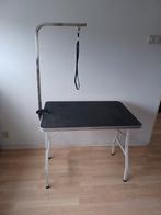 Inklapbare hondentrimtafel, Ophalen