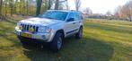 Jeep Grand Cherokee 4.7 I V8 AUT 2006 Grijs, Auto's, Jeep, Automaat, 8 cilinders, 3360 kg, 137 €/maand