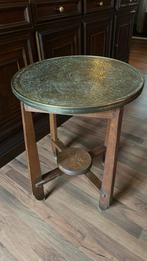 Tafel met koperen blad, Ophalen