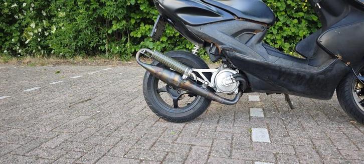 Bijna nieuwe yasuni c16, Fietsen en Brommers, Brommeronderdelen | Algemeen, Gebruikt, Uitlaat, Ophalen of Verzenden