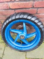 Voorwiel Aprilia SR met nieuwe band, Ophalen