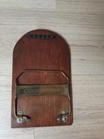 Antieke krantenhouder, Ophalen