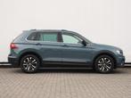 Volkswagen Tiguan 1.5 TSI Comfortline 150PK DSG | Navigatie, Auto's, Stof, 150 pk, Blauw, Bedrijf