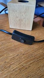 calax lamp, Ophalen