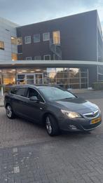 Opel Astra 1.4 Turbo 103KW Sp.tourer AUT 2011 Grijs, Auto's, Opel, 15 km/l, 74 €/maand, Zwart, 4 cilinders