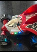 Elektrisch bestuurbare stuntauto met lichteffecten, Ophalen of Verzenden, Gebruikt, Elektro, Auto offroad