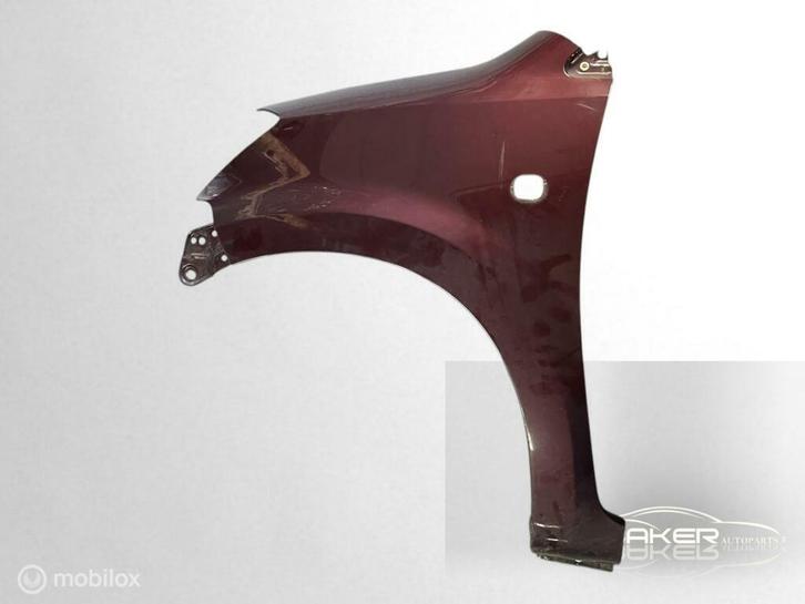 Spatbord links bruin Subaru Justy 1.0 Comfort ('85-'11), Auto-onderdelen, Carrosserie en Plaatwerk, Subaru, Gebruikt, Ophalen of Verzenden