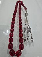 🔥 Opvallende elegantie: Speciaal gedecoreerde vuur-amber ge, Met hanger, Kunststof, Ophalen of Verzenden, Zo goed als nieuw