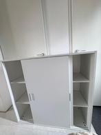 Witte opbergkast met schuifdeuren, Huis en Inrichting, Kasten | Kledingkasten, Kunststof, 100 tot 150 cm, Zo goed als nieuw, 25 tot 50 cm