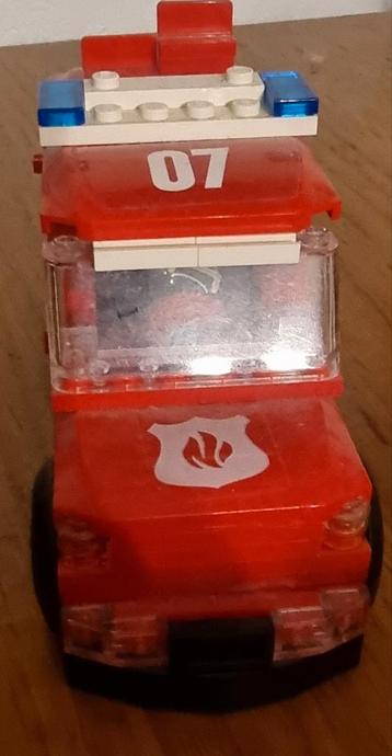 Lego brandweerauto met poppetje. beschikbaar voor biedingen