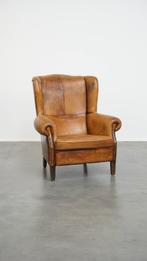 Comfortabele vintage oorfauteuil gemaakt van schapenleer, Huis en Inrichting, Fauteuils, Ophalen, Gebruikt, ., Vintage
