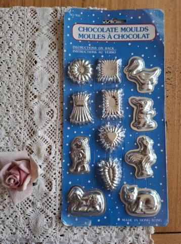 12 Mini chocolade vormpjes in de originele verpakking beschikbaar voor biedingen