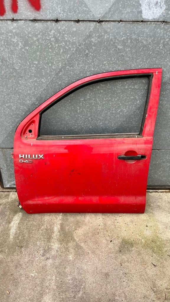 Toyota Hilux deur rood (compleet, onderzijde schade) links, Auto-onderdelen, Ophalen, Gebruikt, Deur, Links