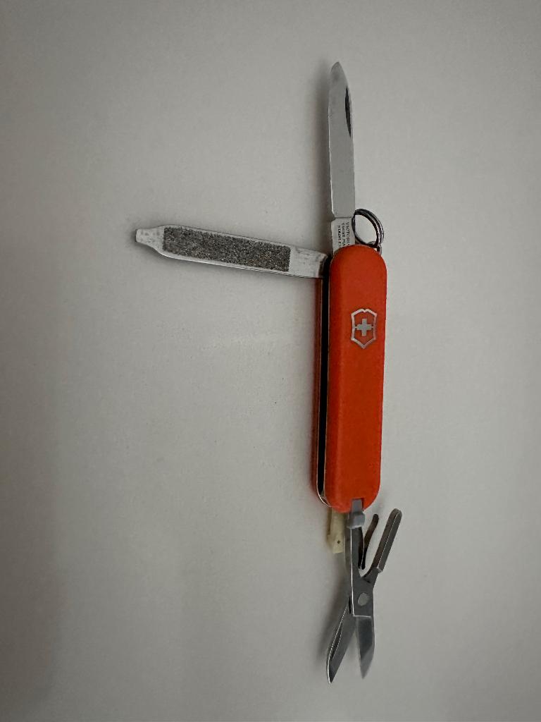 Victorinox mesje oranje, Verzamelen, Ophalen of Verzenden, Gebruikt