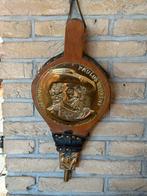 Blaasbalg met koper beslag, Ophalen